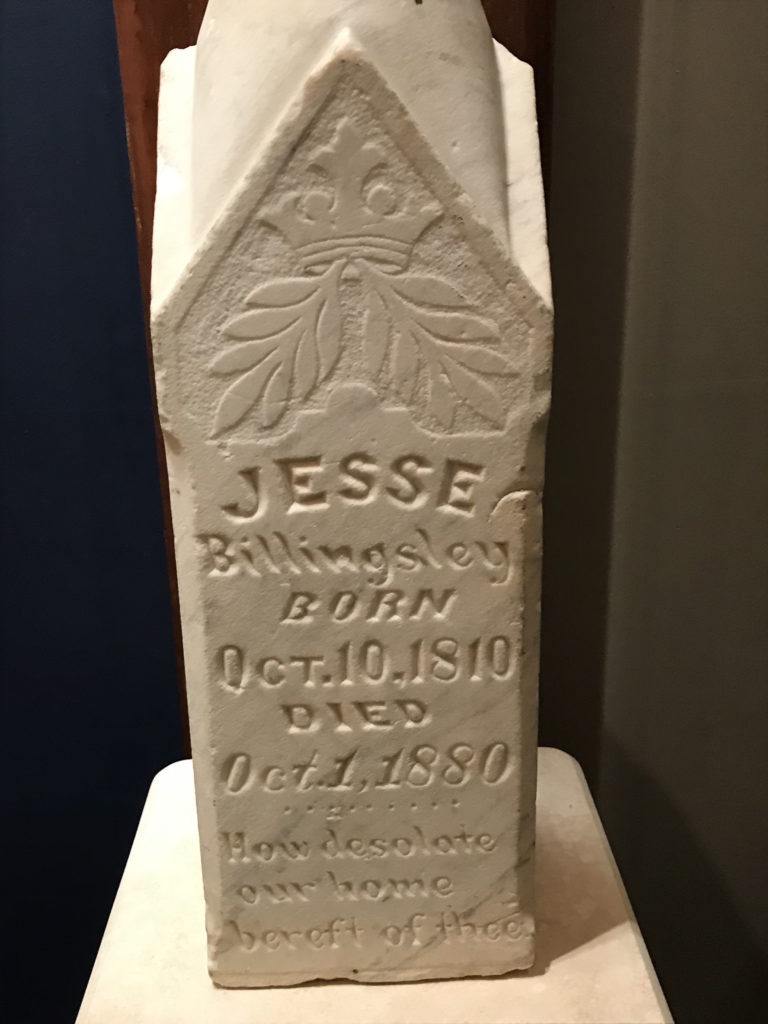 White headstone engraved wiwth Jesse Billingsley