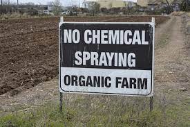 Black sign banning chemical spraying